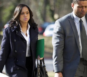 In this March 3, 2016 file photo, Baltimore State's Attorney Marilyn Mosby, left, arrives at Maryland Court of Appeals in Annapolis, Md.