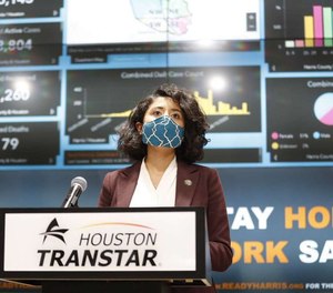 Harris County Judge Lina Hidalgo speaks at a news conference, wearing a mask, to provide COVID-19 announcements and updates, including the new rules requiring everyone to wear masks.