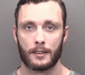 Matthew D. Mattingly, 31, was charged with DWI, battery against a public safety official and other crimes after allegedly punching a firefighter in the face after falling off of his moped.