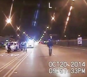 This Oct. 20, 2014 file image is taken from dash-cam video provided by the Chicago Police Department of the Laquan McDonald shooting. (Chicago Police Department via AP, File)