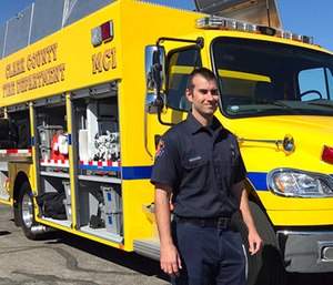Clark County Fire Department engineer Brian Emery stands by one of his agency's Mass Casualty Incident vehicles in Las Vegas.