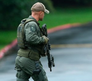 Authorities respond to a shooting in Harford County, Md., on Thursday, Sept. 20, 2018. Authorities say multiple people have been shot in northeast Maryland in what the FBI is describing as an "active shooter situation." (Jerry Jackson /The Baltimore Sun via AP)