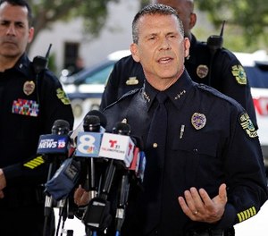 Orlando Police Chief John Mina answers questions at an afternoon news conference during a hostage standoff Monday, June 11, 2018, in Orlando, Fla.