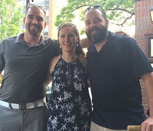 Koch, one year after her injury, celebrates with paramedics Carter Nevill and Luke Tallman, who saved her life.