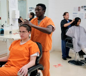 Immigration detainees using a beauty salon that has been set up at a dedicated unit for transgender women in the Cibola County Correctional Center in Milan, N.M.