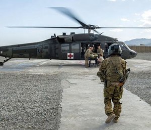 Soldiers in a tactical critical care evacuation team prepare for a patient transfer mission at Forward Operating Base Orgun East, Afghanistan. (Photo/Marleah Miller, Air Force)