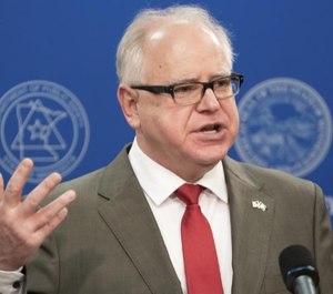 Minnesota Gov. Tim Walz issued an executive order providing first responders with the locations of people diagnosed with COVID-19 in an effort to boost first responder safety. (Photo/TNS)