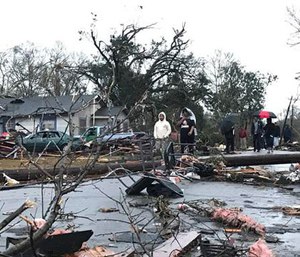 Trees and debris cover the ground after a tornado tornado ripped through the Hattiesburg, Miss., area early Saturday, Jan. 21, 2017. (Ryan Moore/WDAM-TV via AP)