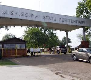 Mississippi's prison system signed a 90-day contract to shift more than 300 inmates to private lockup after a rash of inmate violence. (Photo/AP)