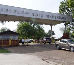 In this May 19, 2010, file photograph, traffic moves past the front of the Mississippi State Penitentiary in Parchman, Miss.