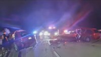Watch: Cop runs onto highway to help drivers avoid fatal crash