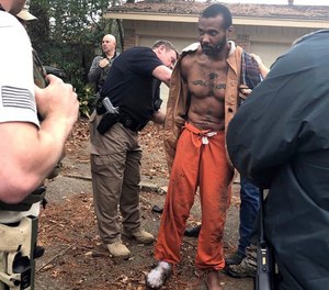 The MMA fighter accused of killing two people before escaping from a private prison van says he had
