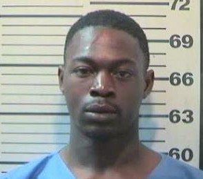 Joshua Dunlap, 22, was arrested and charged with assault for allegedly biting a paramedic in an ambulance after running around naked during a Mardi Gras parade in Mobile, Alabama. (Photo/Mobile Police Department)