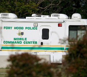 A Fort Hood Police Mobile Command Center is stationed outside the Lawrence H. Williams Judicial Center during proceedings in the court martial of U.S. Army Maj. Nidal Malik Hasan, Wednesday, Aug. 21, 2013, in Fort Hood, Texas.