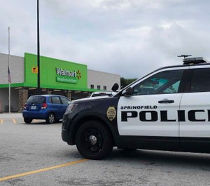 Springfield police respond to a Walmart in Springfield, Mo., Thursday afternoon, Aug. 8, 2019, after reports of a man with a weapon in the store. (Harrison Keegan/The Springfield News-Leader via AP)