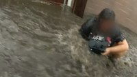 Watch: LEOs rescue family from treacherous flash flood waters