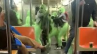 Suspect surrenders in NYC subway attack by group of women in neon green jumpers