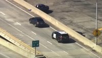 Video catches high-speed pursuit, standoff near LAX as suspect threatens to jump from overpass