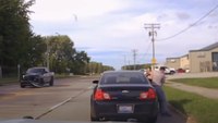 Video: 4 good Samaritans aid LEO struggling with suspect during traffic stop