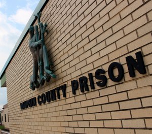 This Aug. 15, 2019 photo, shows the Dauphin County Prison in Harrisburg, Pa. (AP Photo/Michael Rubinkam, File)