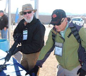 PoliceOne Editor at Large Doug Wyllie and PoliceOne Columnist Lindsey Bertomen examine the polymer handguards from Ascendance International.