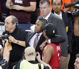 In this Thursday, June 13, 2019, file photo, Toronto Raptors general manager Masai Ujiri, center left, walks with guard Kyle Lowry after the Raptors defeated the Golden State Warriors. (Photo/TNS)