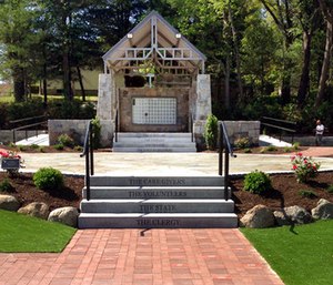 Workers finalize details at a memorial in West Warwick, R.I., at the site of The Station nightclub fire that killed 100 and injured more than 200 people in 2003.