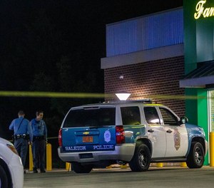 A Raleigh police officer was wounded during a gunfire exchange with a fleeing robbery suspect.