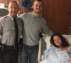 Parents Jimmy and Laura Baker could no longer make it to the hospital, so Sgt. Brian Maynard assisted in the birth.