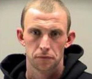 Jacob Freels was charged with driving while intoxicated and other violations after police found him standing next to a crashed pickup truck. (Photo/Dayton Police)