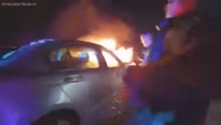 Watch: N.J. police officers race to rescue driver from burning car