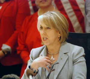 New Mexico Gov. Michelle Lujan Grisham signed a red-flag gun bill Tuesday, Feb. 25, 2020, in Santa Fe, N.M., that allows state district courts to order the temporary surrender of firearms. (Photo/TNS)