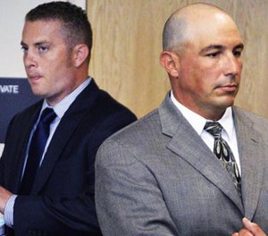 Albuquerque officer Dominique Perez, left, and former Albuquerque Detective Keith Sandy, right, stand up in court after listening to a special prosecutor tell a judge at a preliminary hearing in Albuquerque that they unlawfully shot a homeless camper who posed no threat in Albuquerque, N.M. on Monday, Aug. 3, 2015.