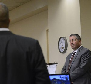 Defense attorney Sam Bregman, right, objects to a question during the trial of two former Albuquerque officers, defendants Keith Sandy, and Dominique Perez, not seen, in court on Tuesday Sept. 20, 2016 in Albuquerque, N.M.