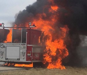 A Normal Fire Department truck was burned up in a highway blaze Wednesday morning.