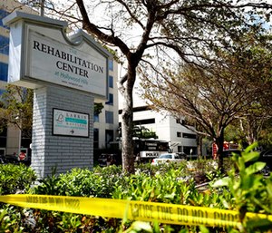 Police surround the Rehabilitation Center in Hollywood Hills, Fla.