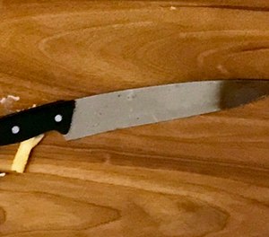 This photo, provided by the New York City Police Department, Friday, Feb. 8, 2019, shows a butcher knife that police say was used in an attack. New York police on Friday fatally shot the man they say was attacking his domestic partner with the butcher knife.