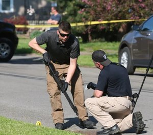 Police recover an AR-15 while searching the crime scenes where a police officer was shot along with another person in a span of two hours.