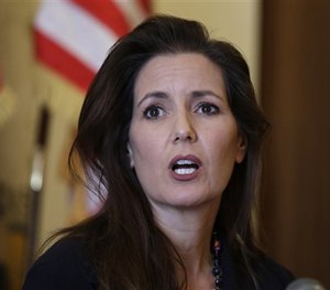 This June 15, 2016, file photo shows Oakland Mayor Libby Schaaf answering questions during a news conference at City Hall in Oakland, Calif.