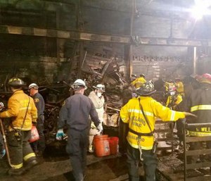 This photo provided by the City of Oakland shows inside the burned warehouse after the deadly fire that broke out on Dec. 2, 2016, in Oakland, Calif.