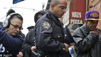 Obama offers help to NYPD after 2 officers killed
