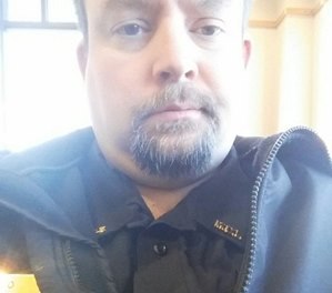 Officer Joseph Gomm was attacked in an industry building at a prison and died of blunt-force trauma.