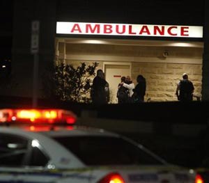 Rochester Police Department officers arrive at Rochester General Hospital after an officer was shot in Rochester, N.Y. on Wednesday, Sept. 3 2014.