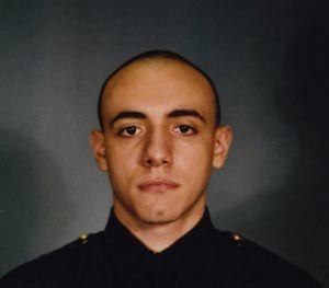 This photo provided by the Jersey City Mayor's office shows Officer Melvin Santiago. (AP Image)