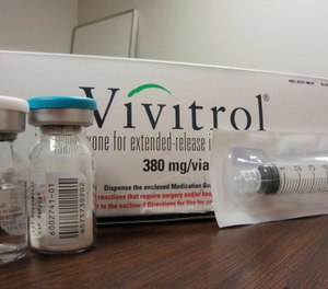 This Oct. 19, 2016 photo taken at Family Guidance Center, an addiction treatment center in Joliet, Ill, shows the packaging of Vivitrol, a high-priced monthly injection used to prevent relapse in opioid abusers. U.S. prisons are experimenting with the medication, which could help addicted inmates stay off heroin and other opioid drugs after they are released.