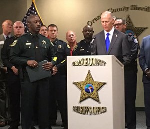 Central Florida law enforcement leaders joined Gov. Rick Scott for a signing of House Bill 477.