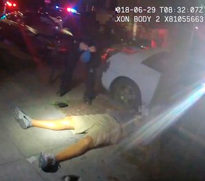 This June 29, 2018, file video image from a police officer's body cam and provided by Portland State University shows Jason Washington after he was shot and killed by Portland State University police officers in Portland, Ore. Grand jury testimony released by a district attorney Tuesday, Oct. 9, into the fatal shooting by university police of a man during a brawl outside a Portland, Oregon, bar describes a chaotic scene in which the two officers had to make a split-second decision when they saw a pistol in the man's hand. (Portland State University via AP, File)