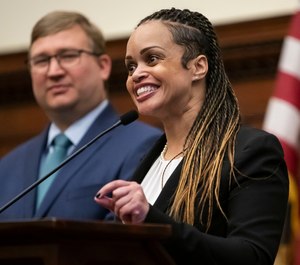 In this Dec. 30, 2019, Danielle Outlaw, right, speaks during a press conference where she was introduced as the new Commissioner of the Philadelphia Police Department at City Hall in Philadelphia. (Photo/AP)