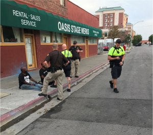 UHP troopers and SLCPD officers on foot patrol in the Rio Grande District conducting enforcement and outreach.