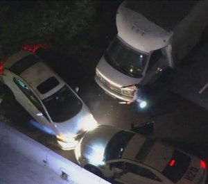 During a chase involving police vehicles and a police helicopter, an officer was injured and a suspect arrested. (Photo/TNS)